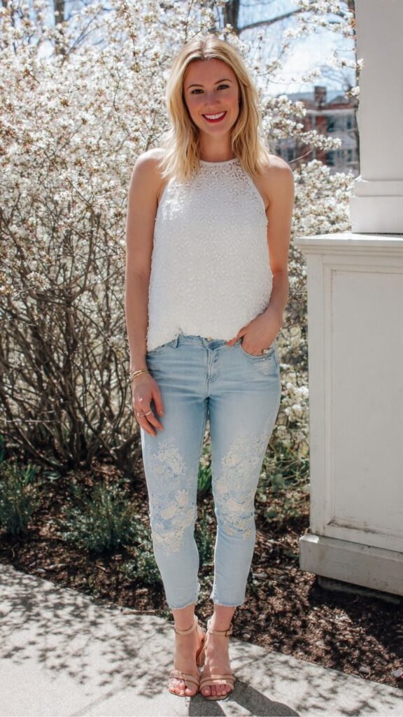 Sleeveless White Top With Embroidered Jeans