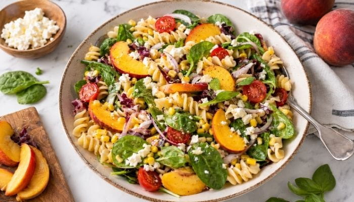 Peach, Tomato & Corn Arugula Pasta Salad
